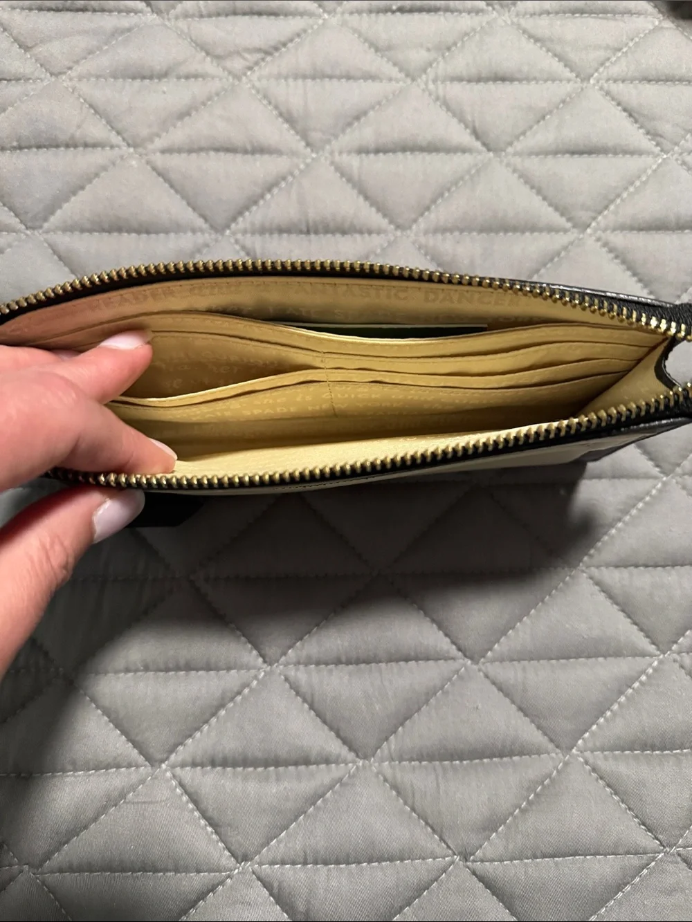kate spade cream and black two-tone leather zip wallet